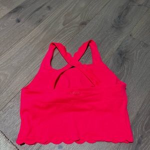 KIAVA Tankini swim top, size medium.  It has a ruffle trip on bottom.